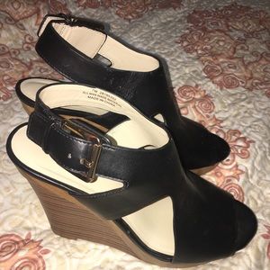 Black leather wedges
